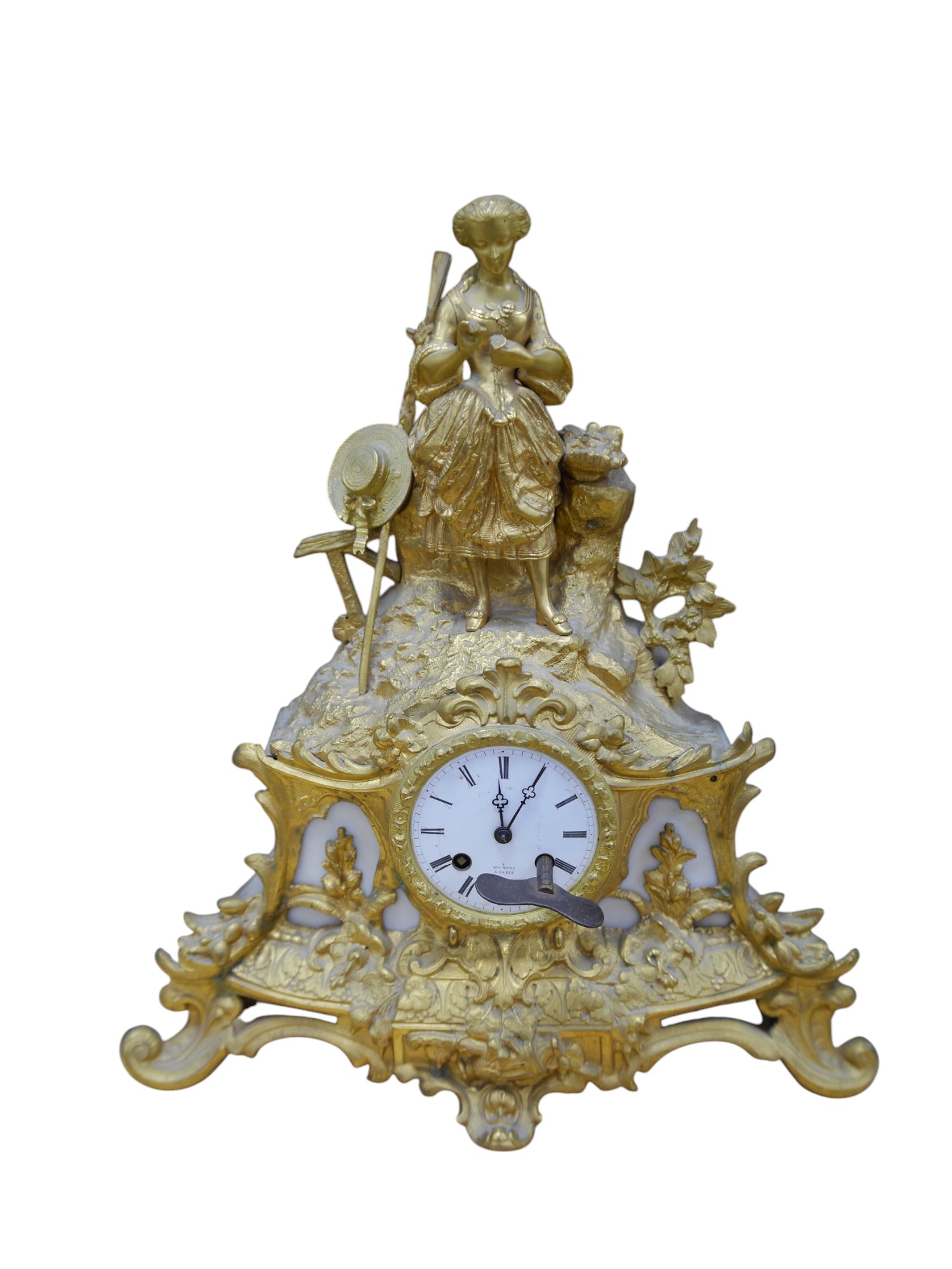 A 19th century French gilt spelter eight day mantel clock with surmount of a lady, with key, no pendulum, 41cm. Condition - fair to good, not tested